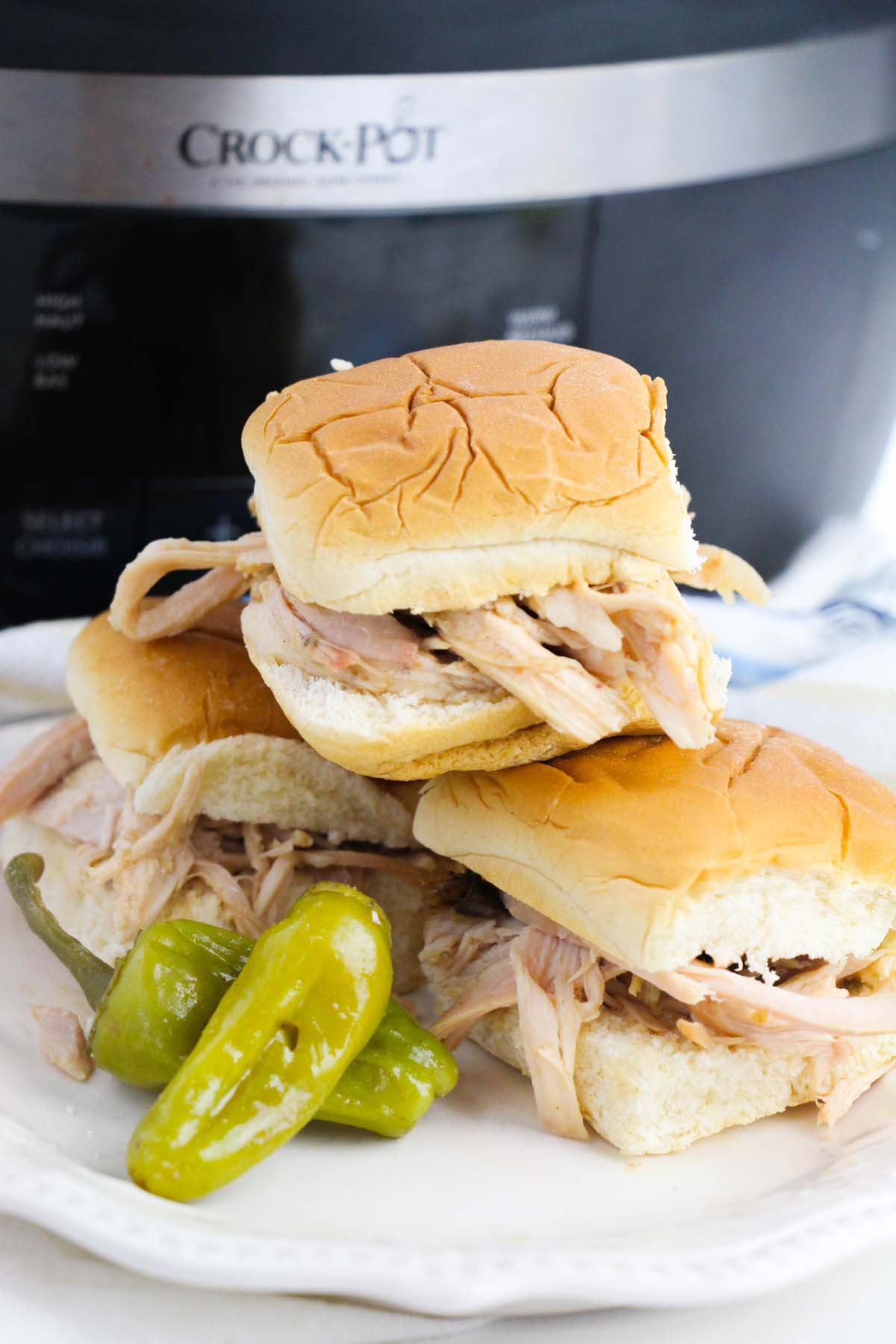 Chicken sandwiches made with Hawaiian rolls.