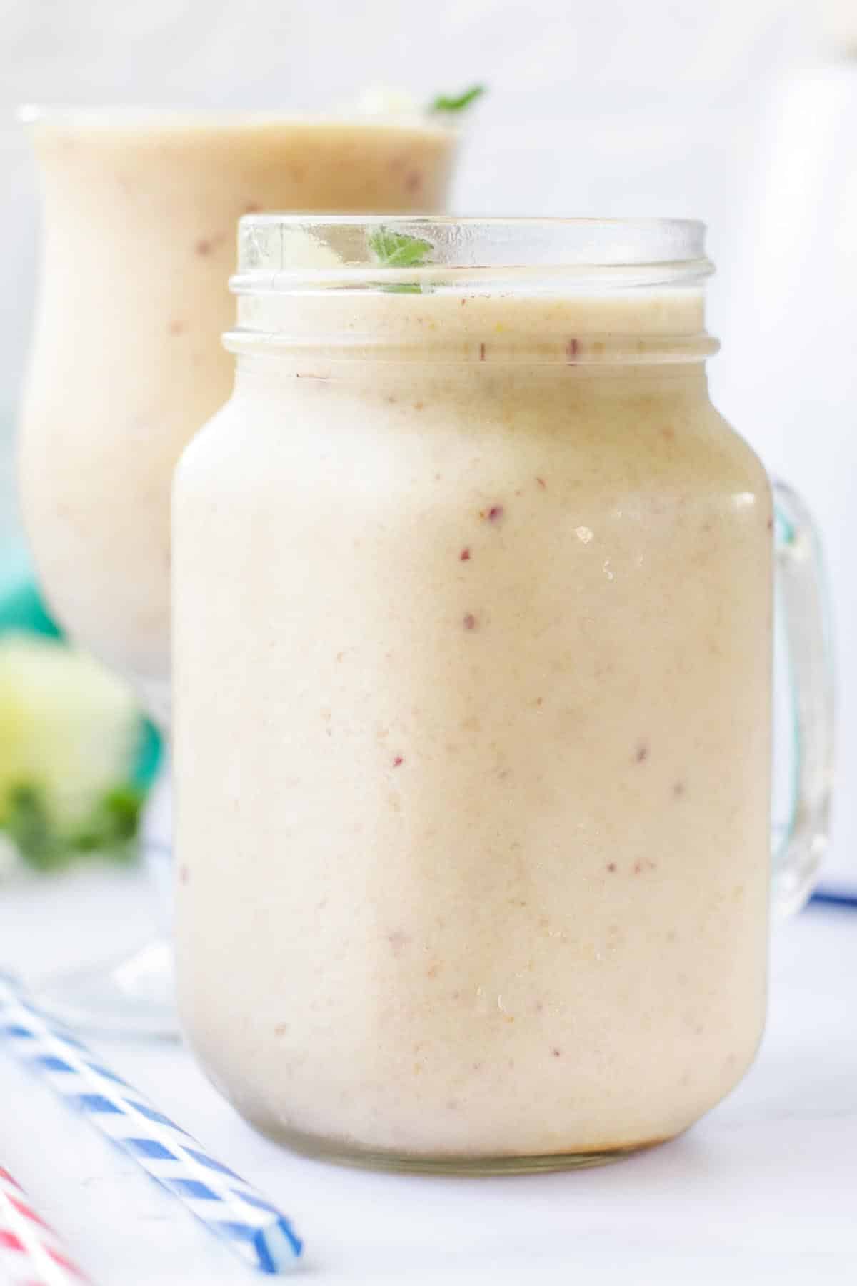Smoothie in a glass mason jar.