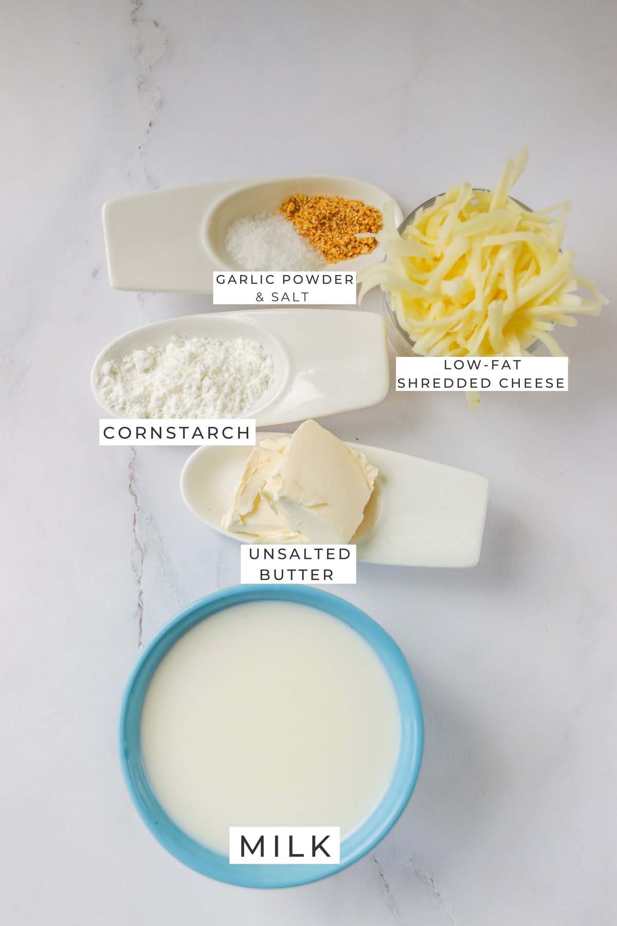 Labeled ingredients for the cheese sauce.