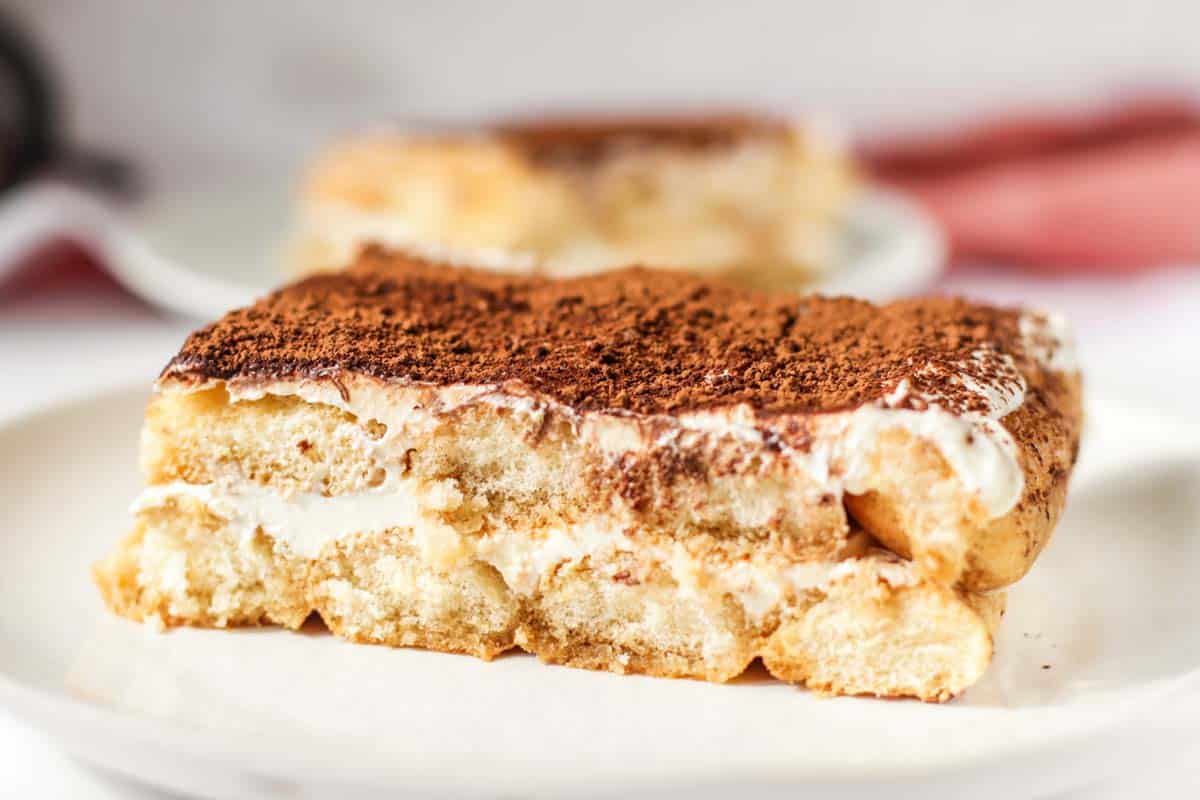 A slice of tiramisu on a plate.