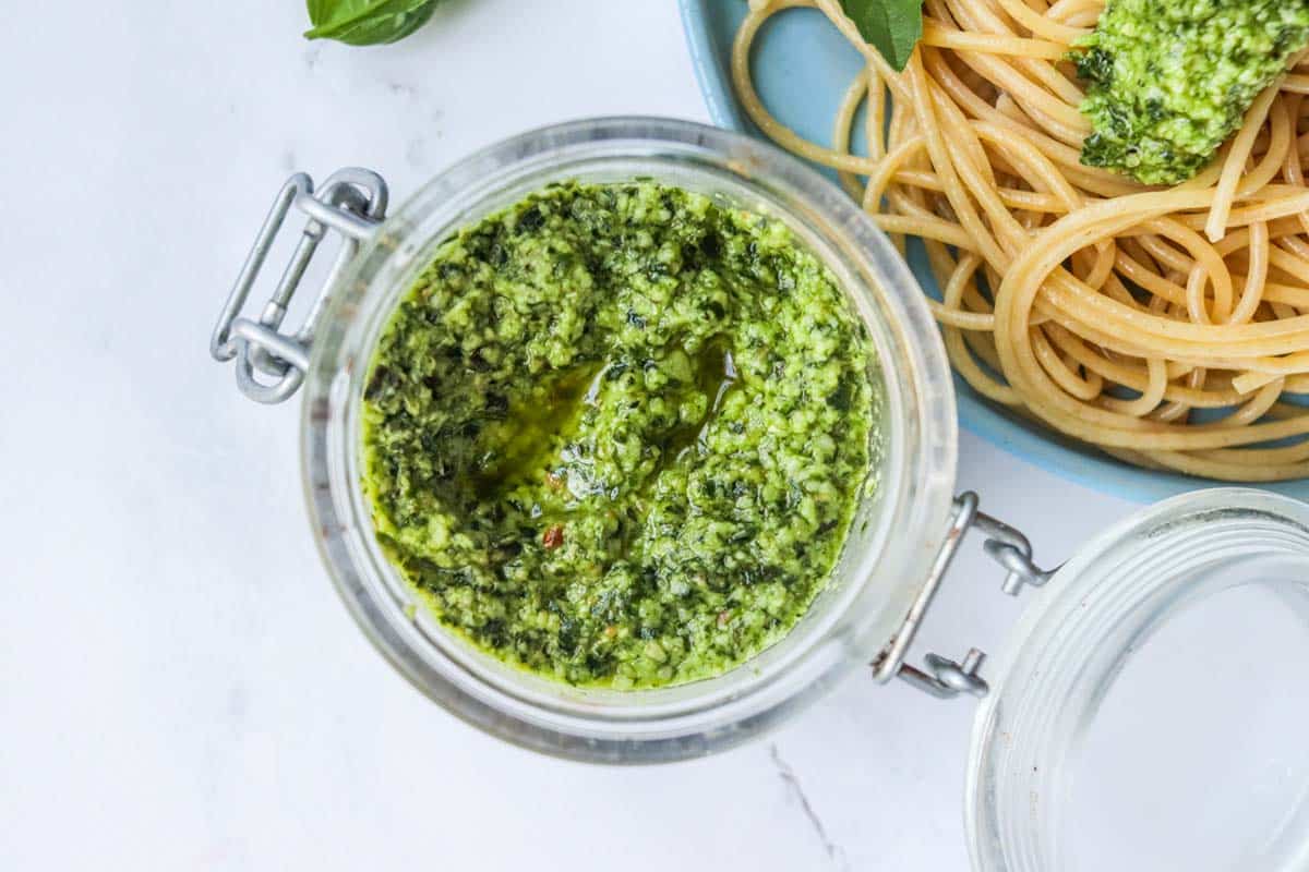 Pesto in a clear container.