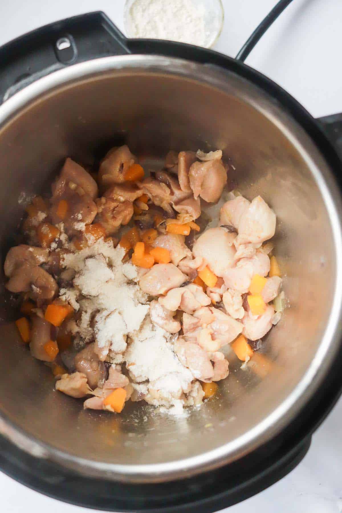 Chicken and carrots in the Instant Pot.