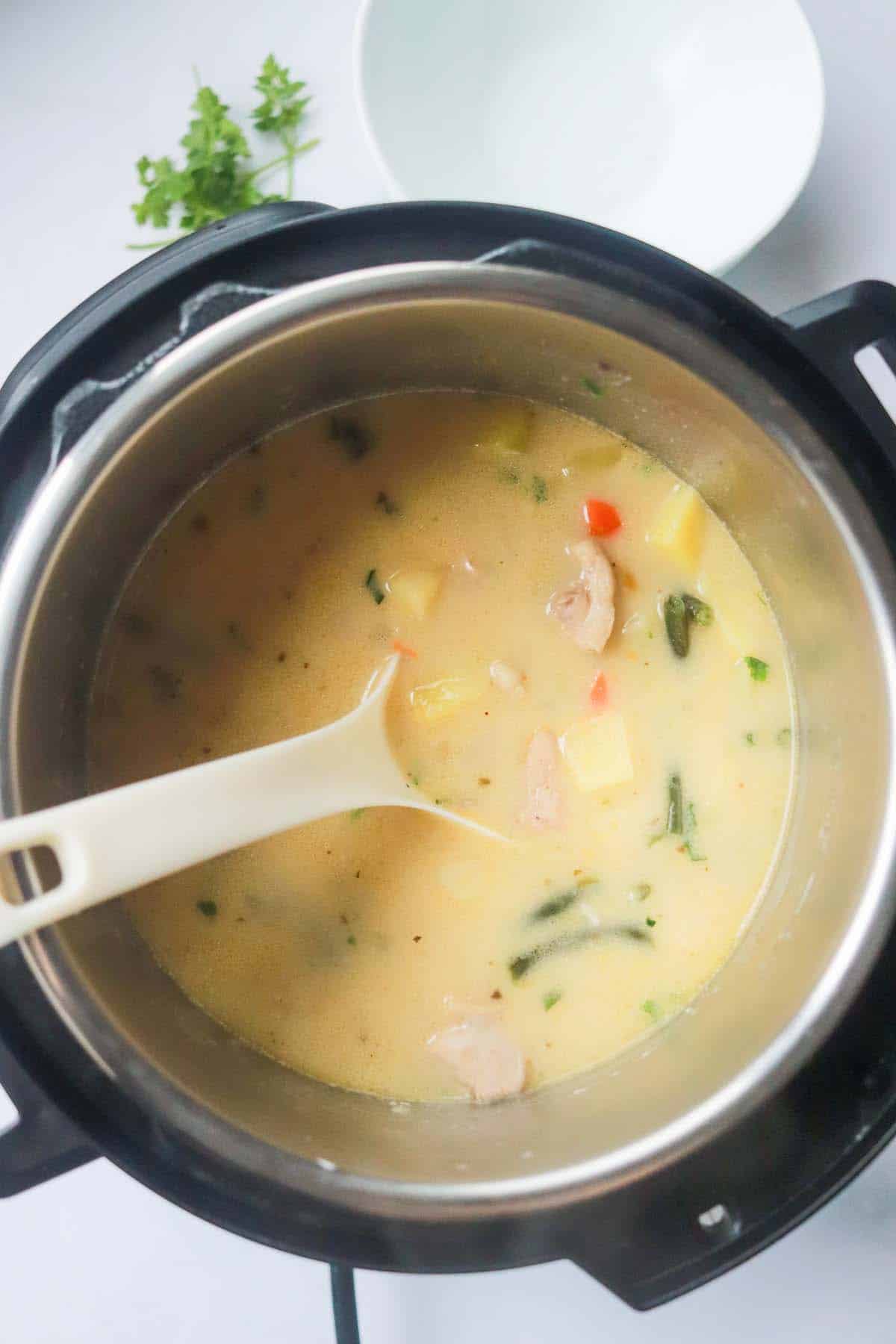Cream added to the soup in the Instant Pot.