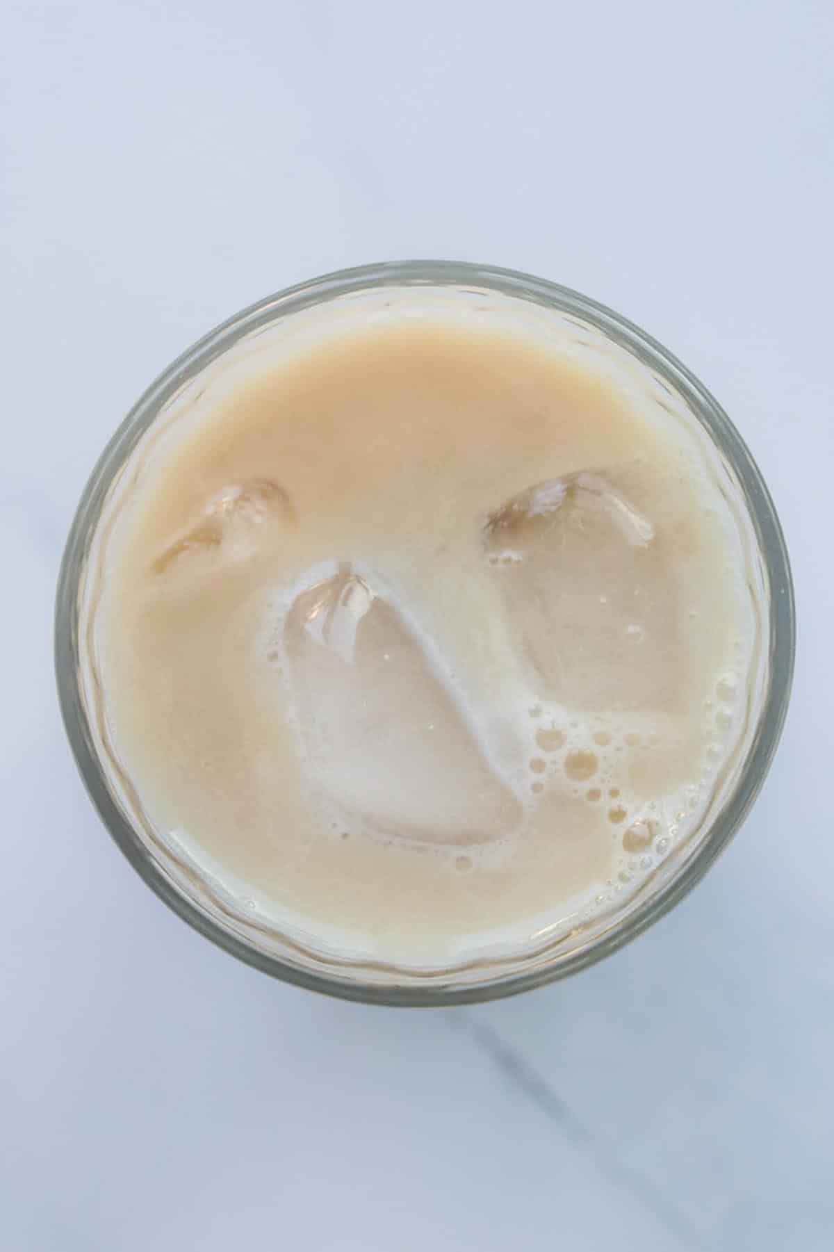 Milk tea in a glass with ice.