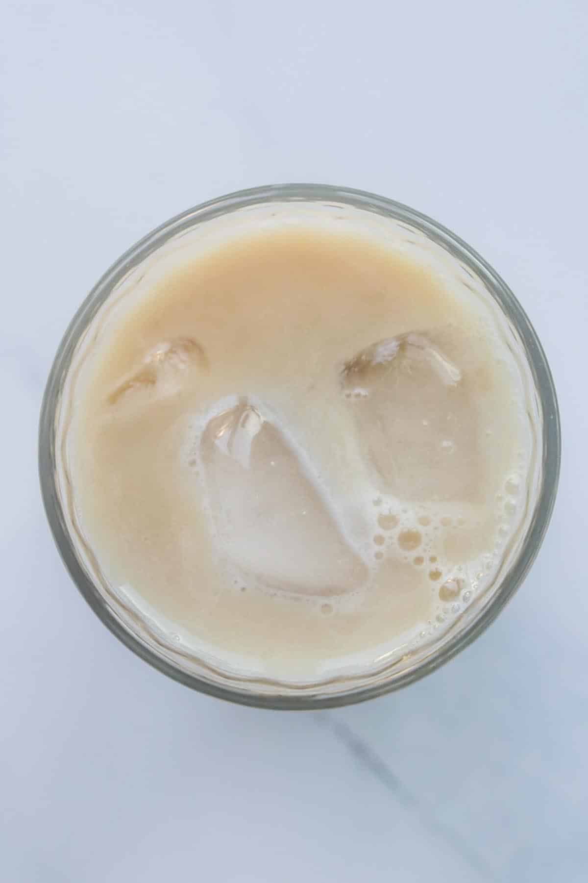 Milk tea in a glass with ice.