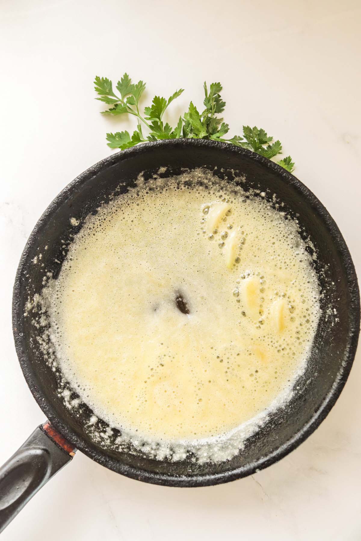 Making the roux in a skillet.