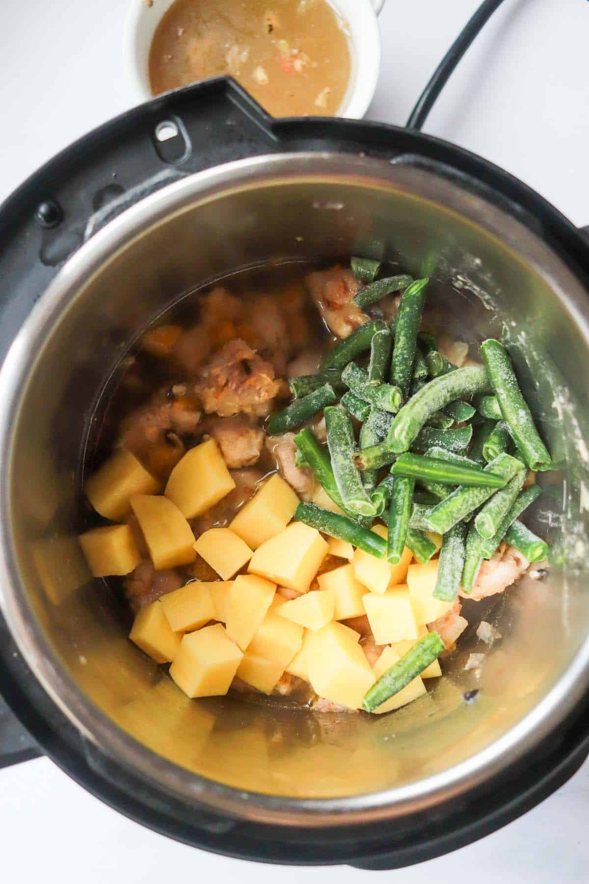 Potatoes and green beans in the Instant Pot.