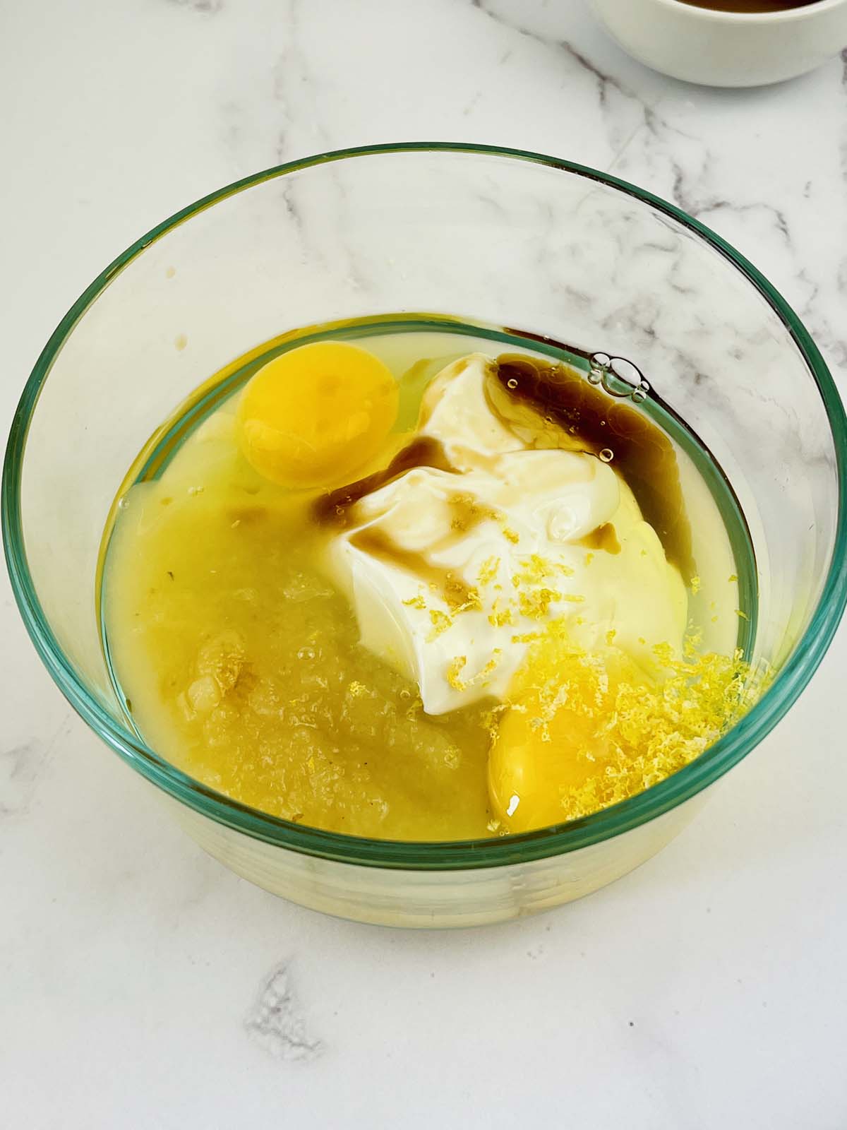 Wet ingredients in a mixing bowl.