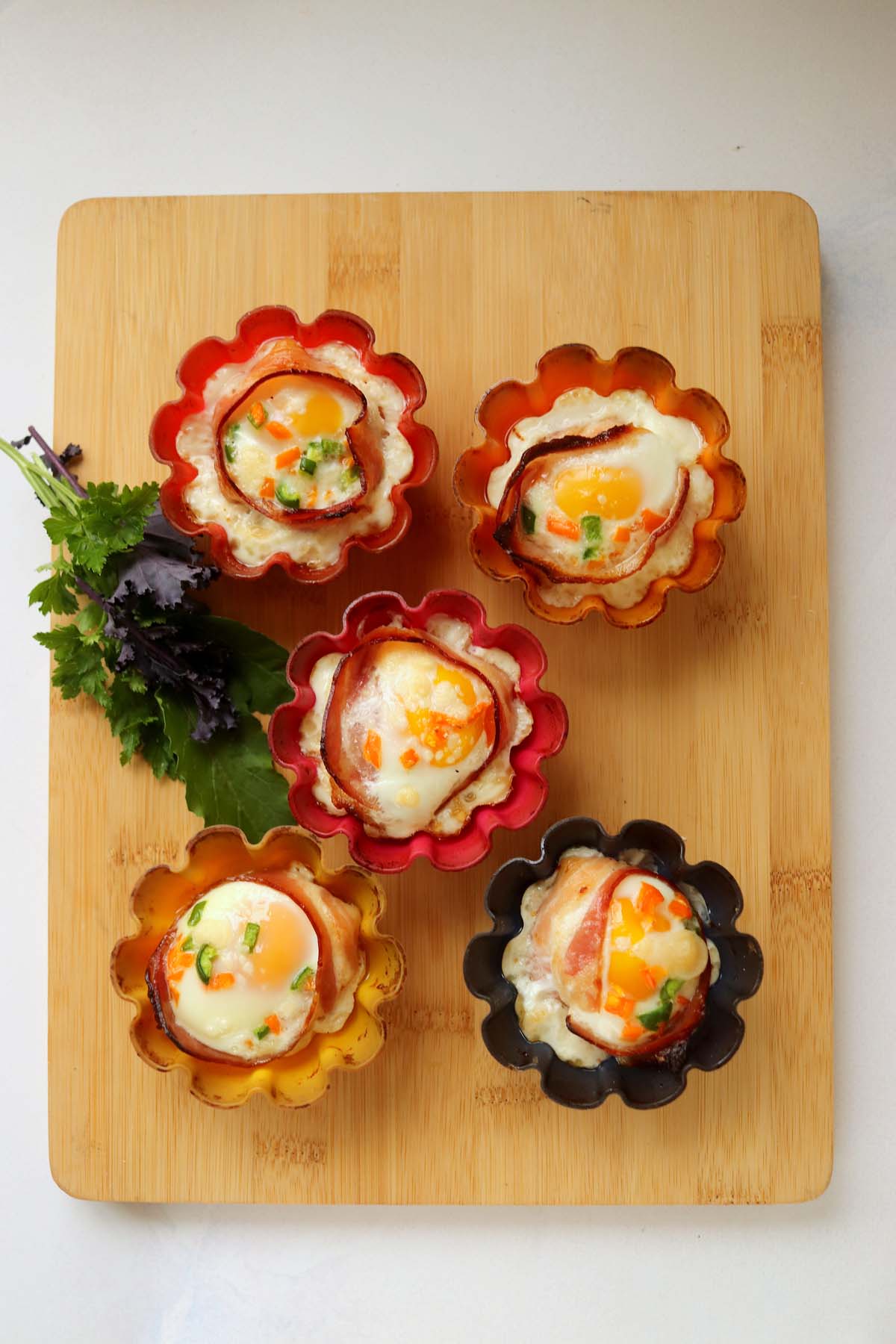 Baked egg cups in silicone liners.