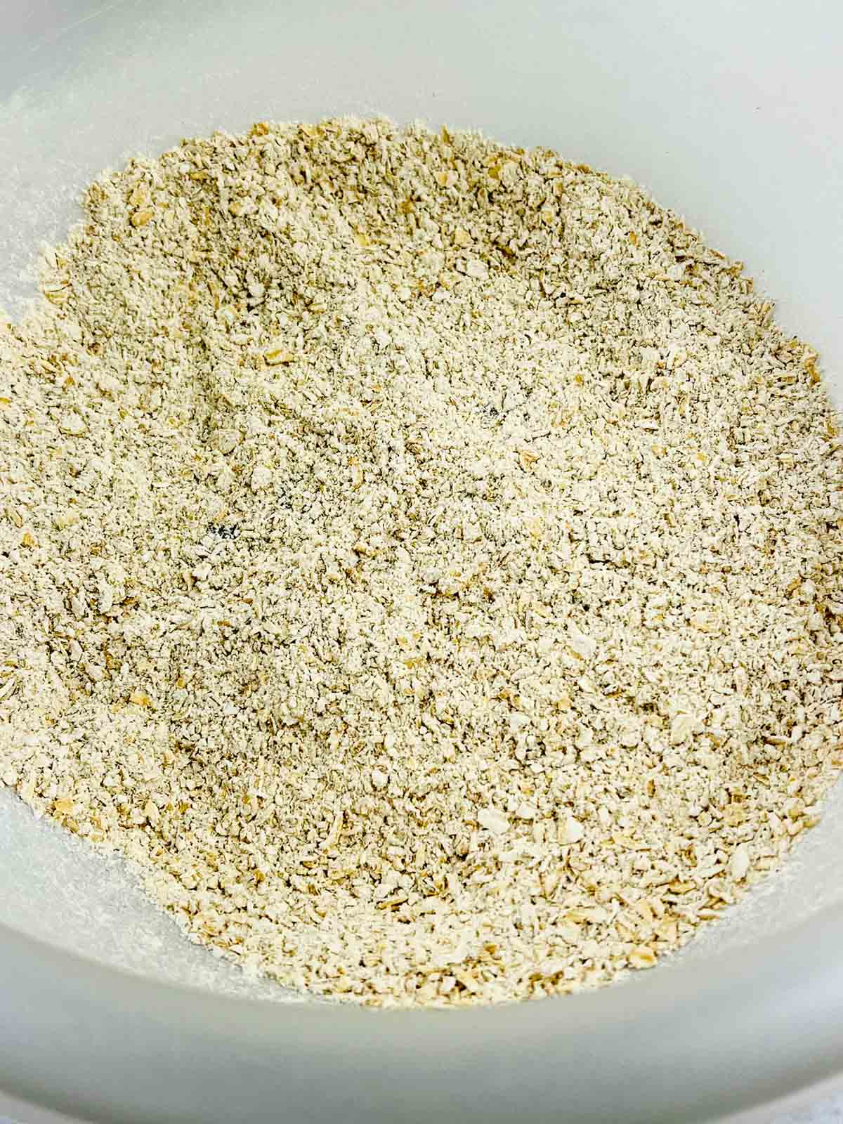 Ground up oats in a mixing bowl.