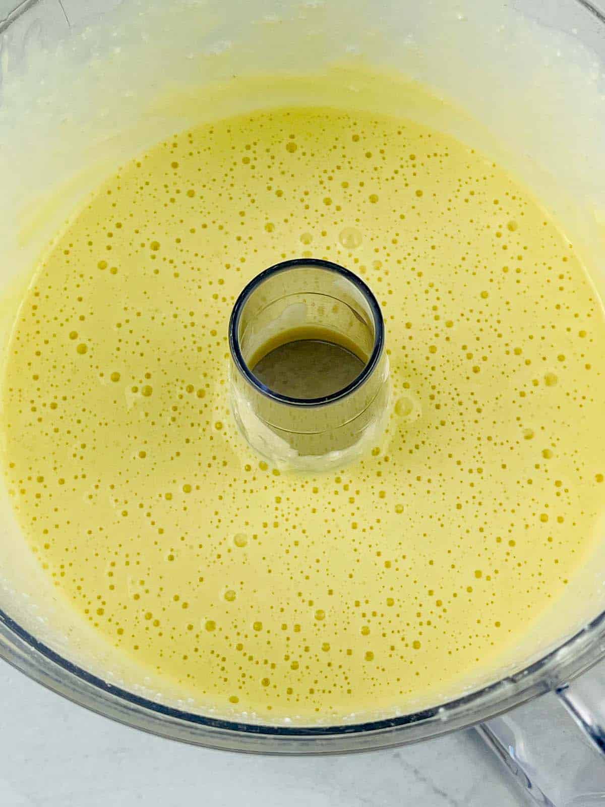 Wet ingredients in a food processor.