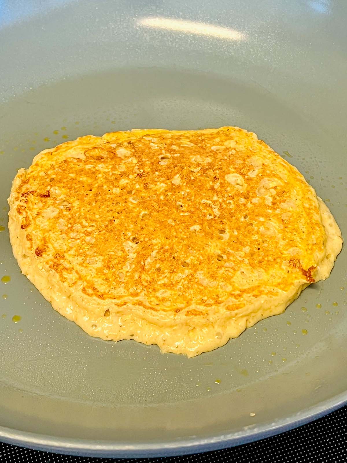 Cooked pancakes in the frying pan.