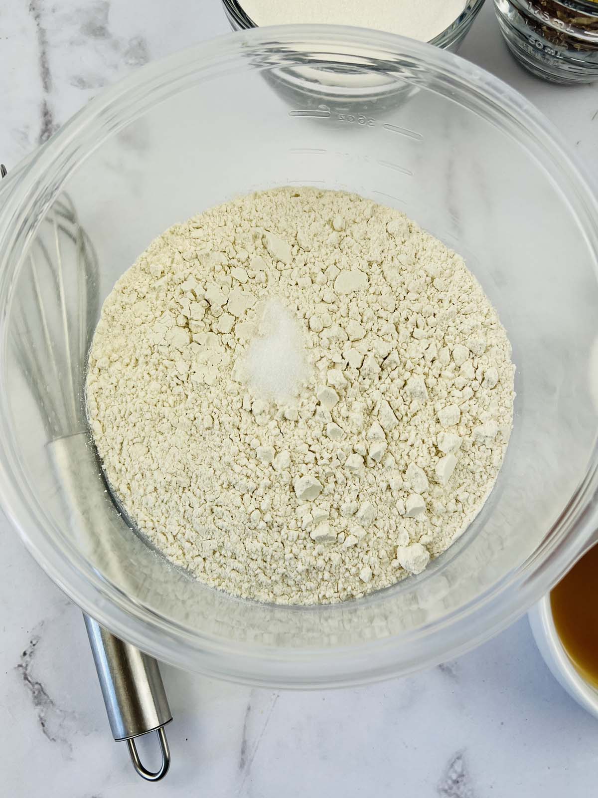 The dry dough ingredients in a mixing bowl.