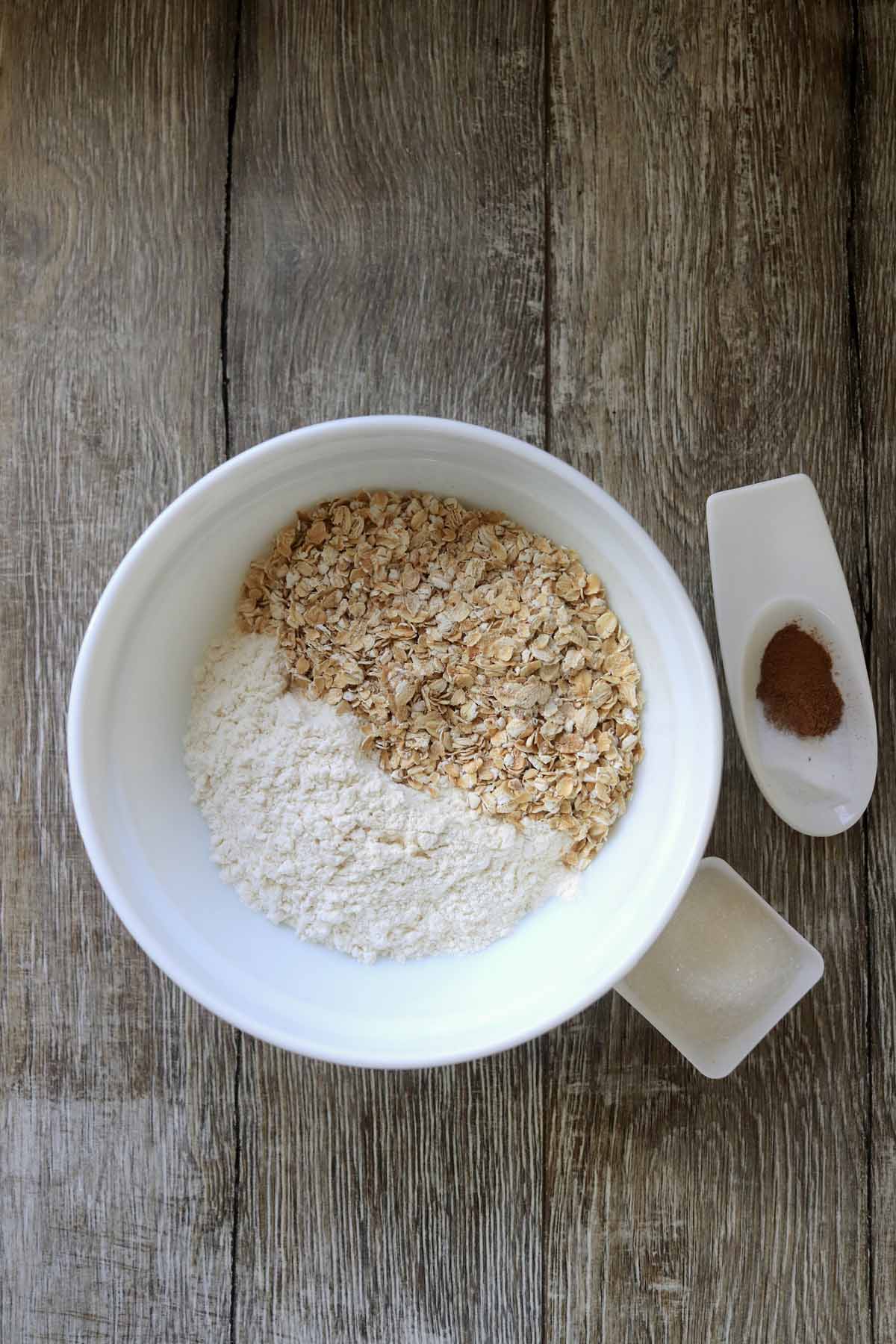 Flour and oats in a mixing bowl.