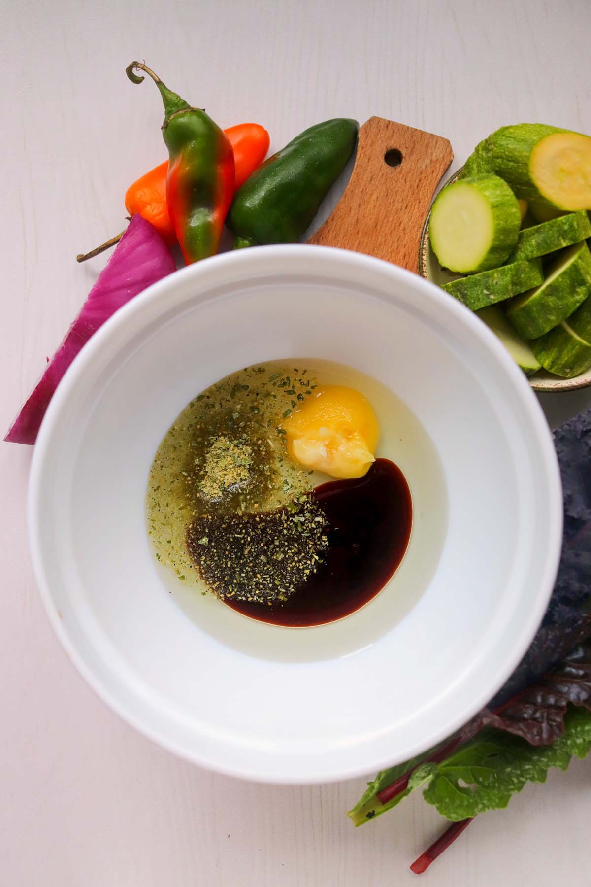 The marinade ingredients in a mixing bowl.