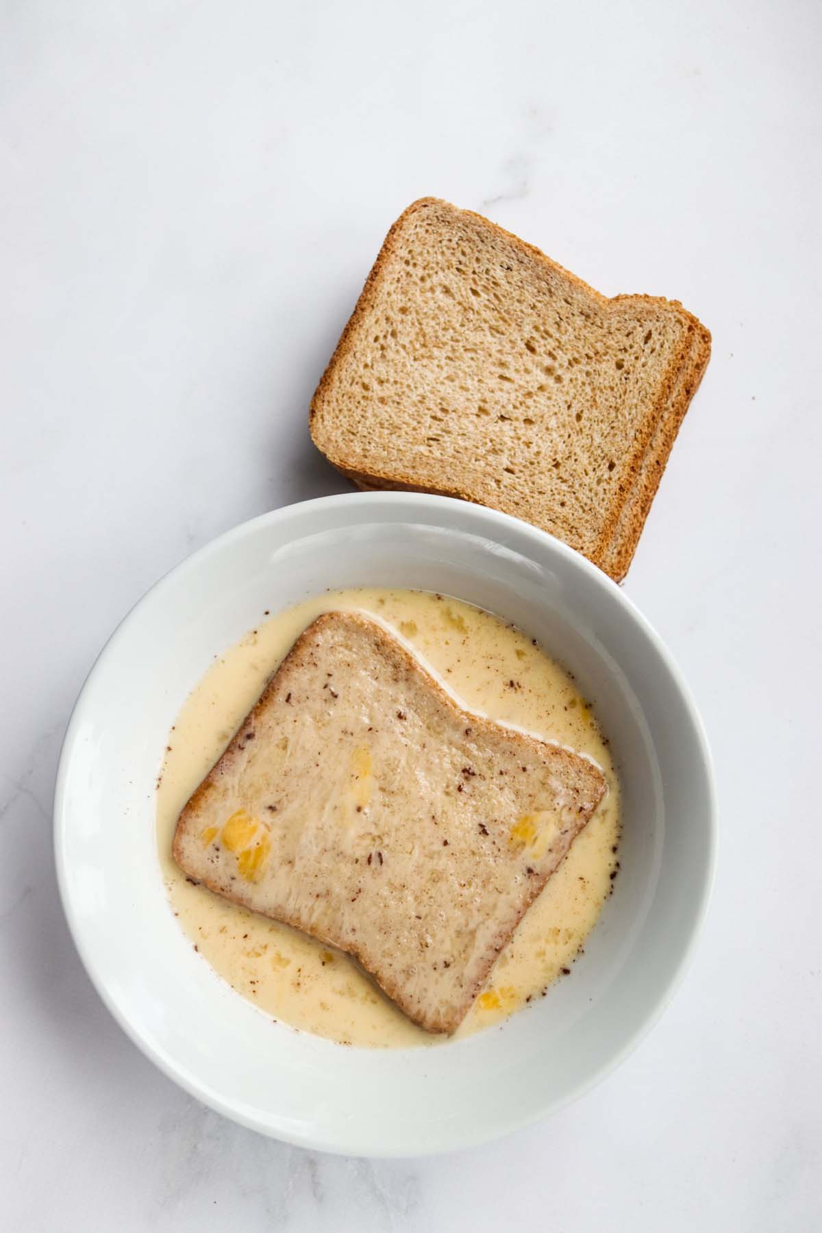 Bread soaked in French toast batter.