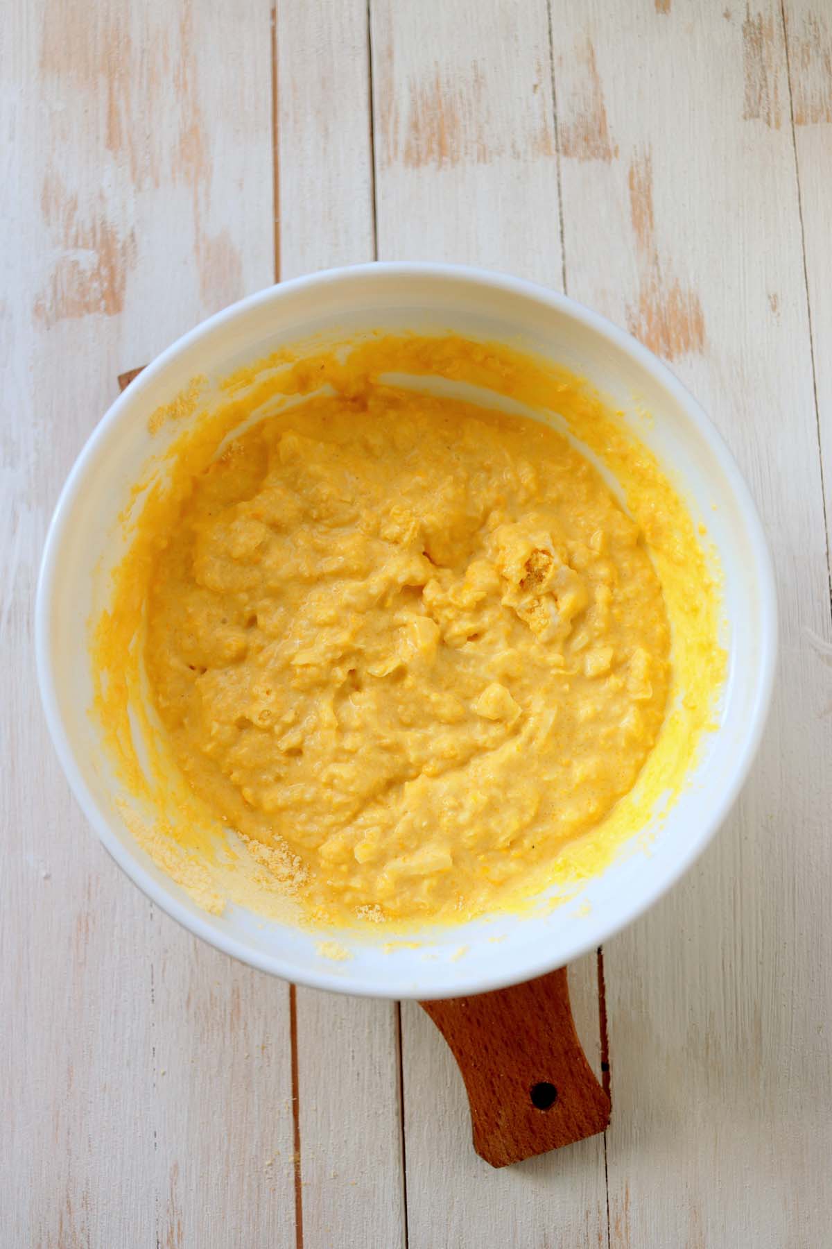 Cornbread batter in a bowl.