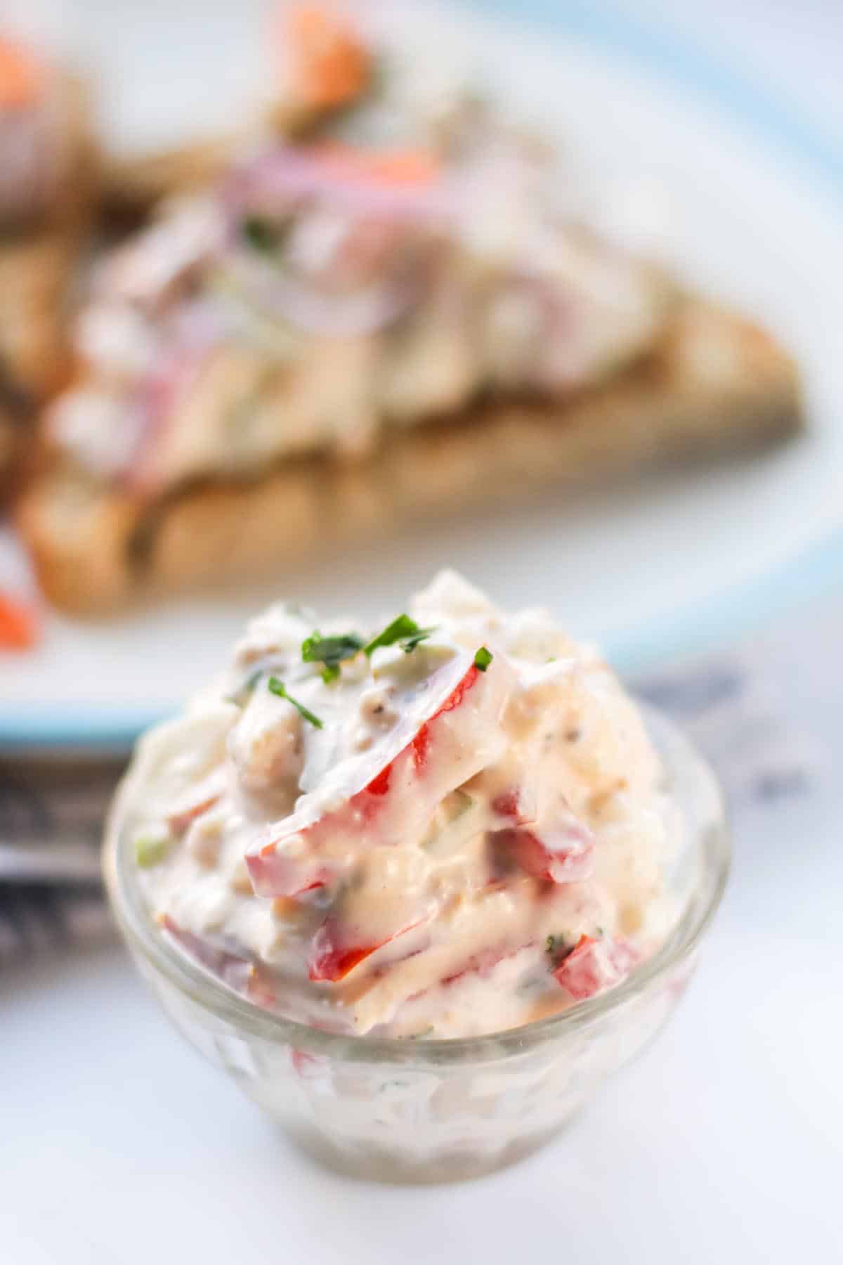 Egg salad in a small bowl.