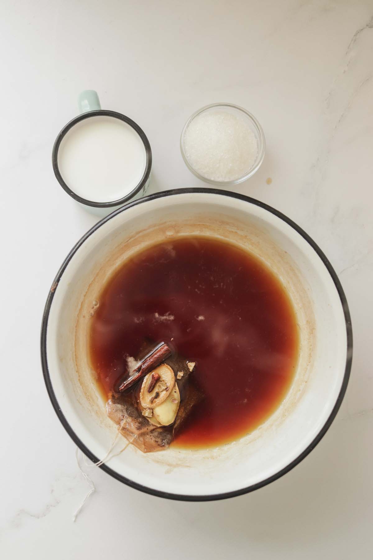 Tea bags steeping in a bowl.