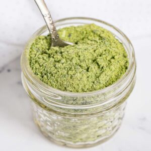 Dehydrated jalapeño powder in a jar.