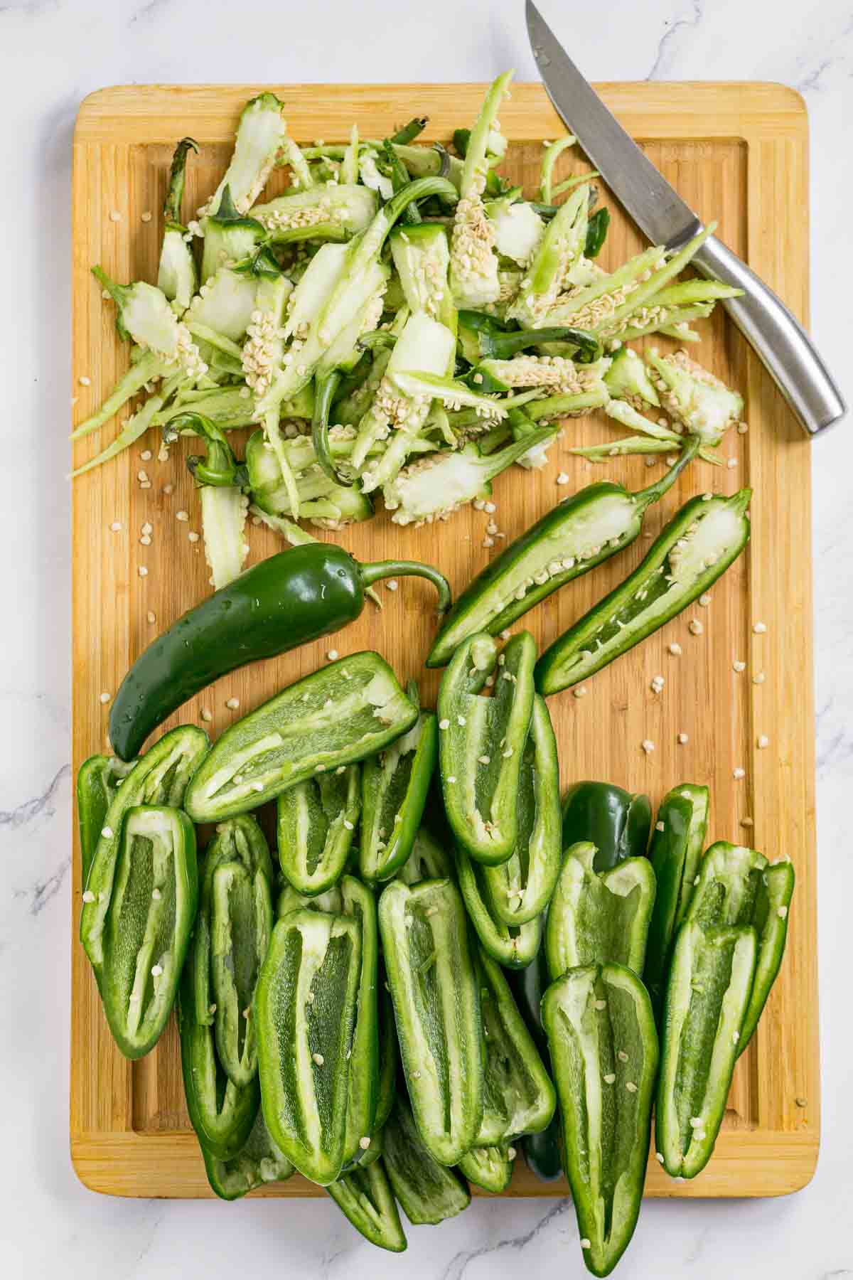 Cutting board with cleaned out jalapeños