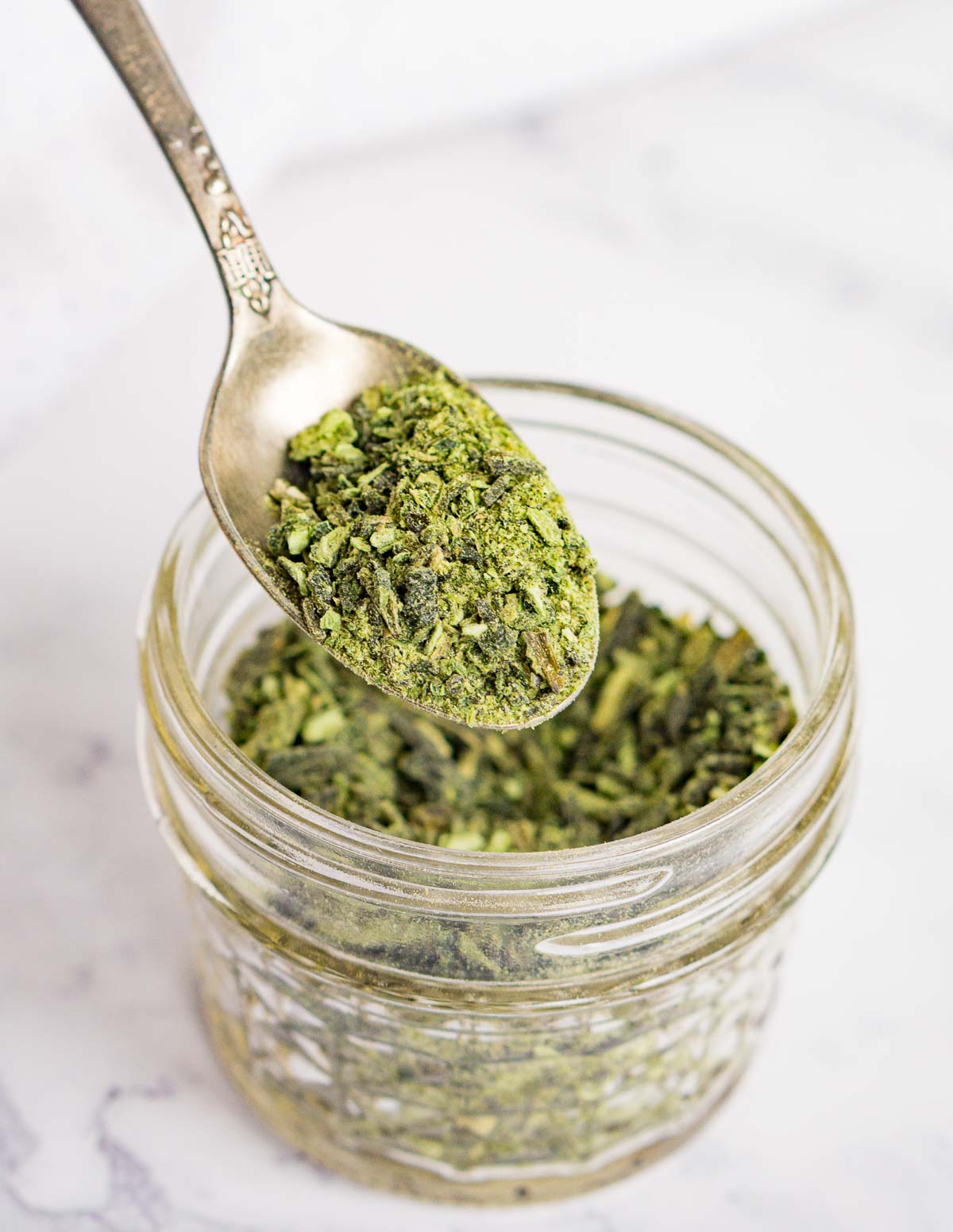 Dehydrated jalapeño flakes on a spoon