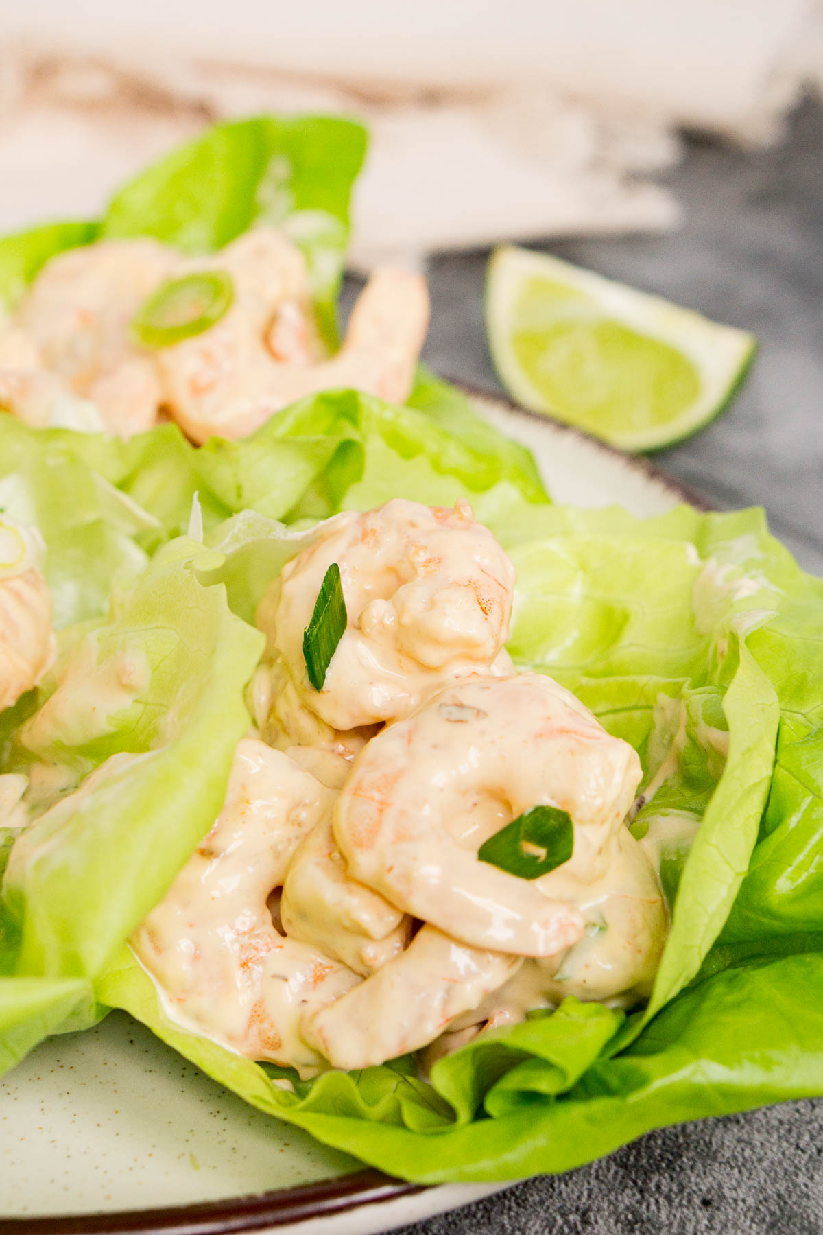 Creamy bang bang shrimp in lettuce wraps