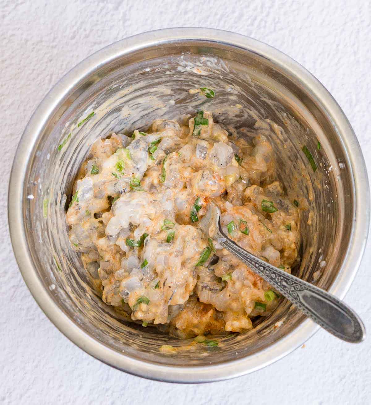 Bowl of seasoned shrimp paste to make shrimp toast