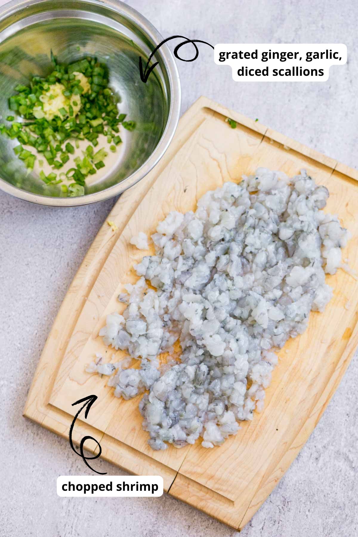 Chopped shrimp and a bowl of grated aromatics